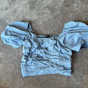 Blue ruffle top